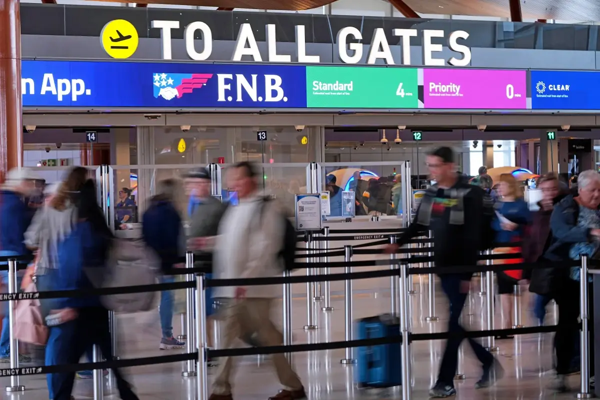 US airports face long lines as DHS disruption forces passengers to change travel plans nationwide
