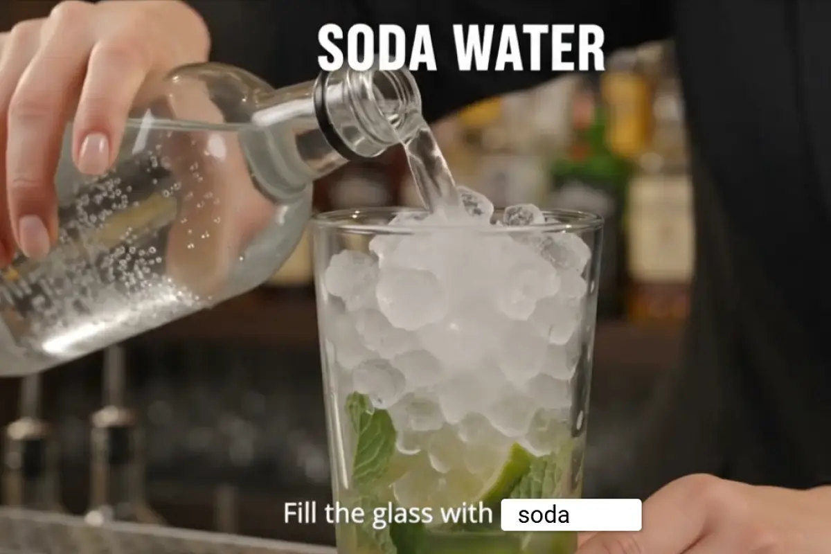 Top with soda water and stir lightly.