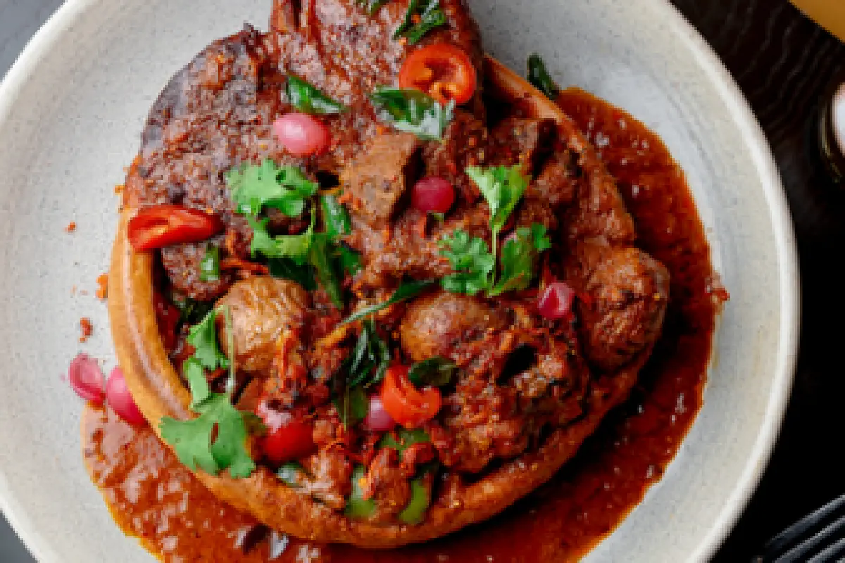 Reimagines Sunday Roast With Curried T-Bone in Giant Yorkshire