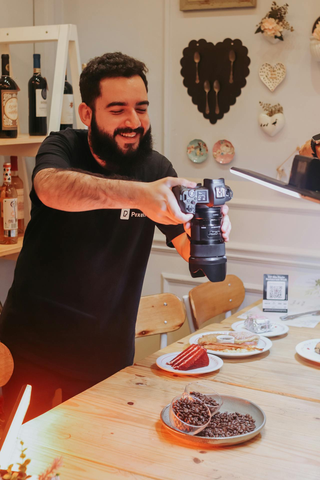 Person filming a video with branded products, representing the process of influencer marketing and brand collaboration.