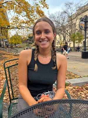 Violet Bluestein, 21, a senior at the University of Wisconsin-Madison, is majoring in journalism and supports Kamala Harris for President. She hopes Harris can bring the U.S back to a place of "humanity and goodness and unity."