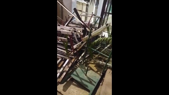 Hurdles were allegedly dumped in a corner by the organisers of a concert at the JLN Stadium. (HT Photo)