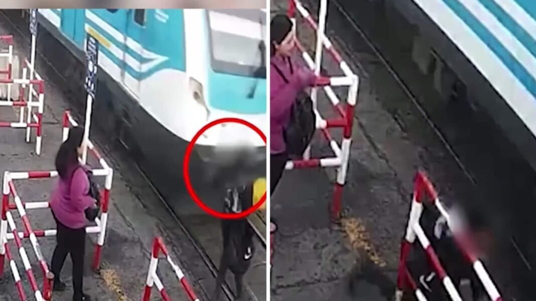 Commuter looking into phone narrowly escapes death as speeding train arrives. Heart-stopping video | Trending