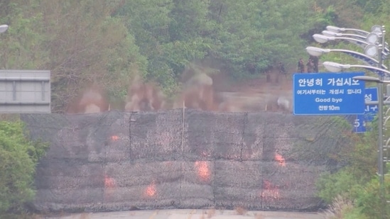 Fire and smoke rises after North Korea blows up sections of inter-Korean roads on its side of the border between the two Koreas, according to South Korea's military, as seen from the South Korean side, October 15, 2024, in this screen grab from a handout video.(Reuters)