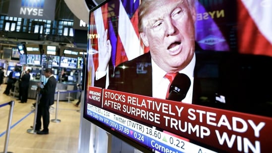 FILE - An image of President-elect Donald Trump appears on a television screen on the floor of the New York Stock Exchange, Nov. 9, 2016. (AP Photo/Richard Drew, File)(AP)