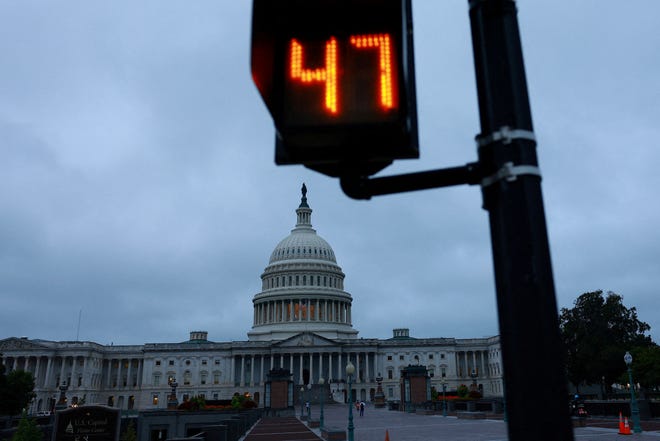 A traffic light countdown timer is seen in front of the U.S. Capitol building, ahead of the election of the 47th U.S. president on November 5, in Washington, U.S., September 30, 2024.