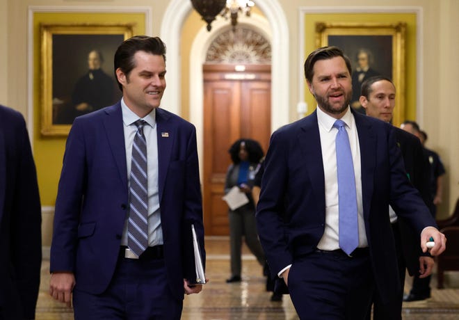 Former U.S. Rep. Matt Gaetz (R-FL) (L) the President-elect Donald Trump's nominee to be Attorney General walks alongside Vice President-elect JD Vance (R) as they arrive for meetings with Senators at the U.S. Capitol on November 20, 2024 in Washington, DC.