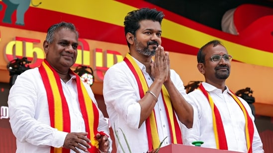 Viluppuram [Tamil Nadu], Oct 27 (ANI): Actor and founder of Tamilaga Vettri Kazhagam, Vijay greets the crowd during his party's first political rally, at Vikravandi in Villupuram on Sunday. (ANI Photo)