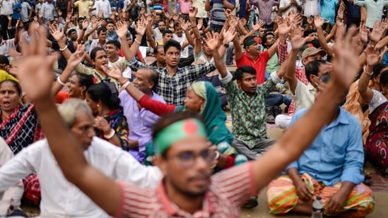 Bangladesh Hindus shout slogans during a protest rally in Bangladesh (AP Photo/Mahmud Hossain Opu)(AP)