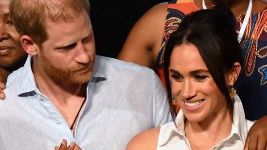 Colombia's Vice President Francia Marquez (2nd R) greets Colombia's former Education Minister Aurora Vergara (2nd L) next to Britain's Prince Harry (C), Duke of Sussex, and his wife Meghan Markle during a picture (AFP)