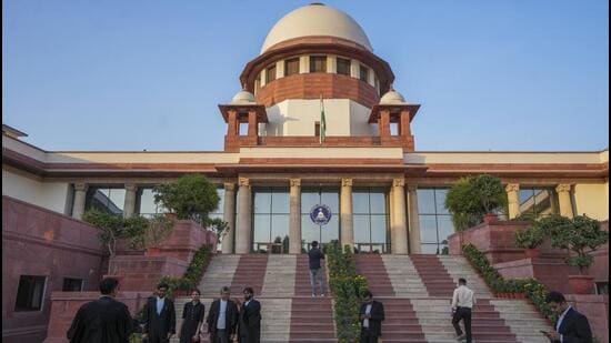 Lawyers at the Supreme Court complex in New Delhi. (PTI Photo)