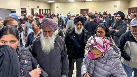 Indians at a consular camp in Brampton, Ontario, Sunday. The consular camp witnessed violent disruptions on Sunday as per Indian High Commission in Canada. (PTI)