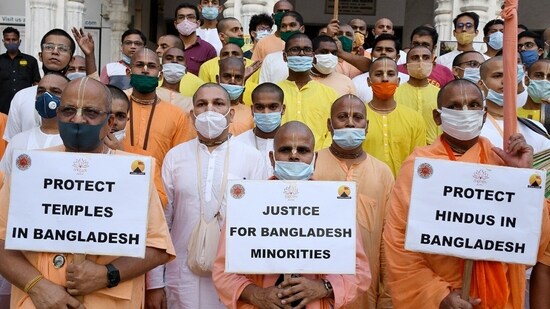 ISKON priests hold placards during a protest against violence in Bangladesh.(ANI File Photo)