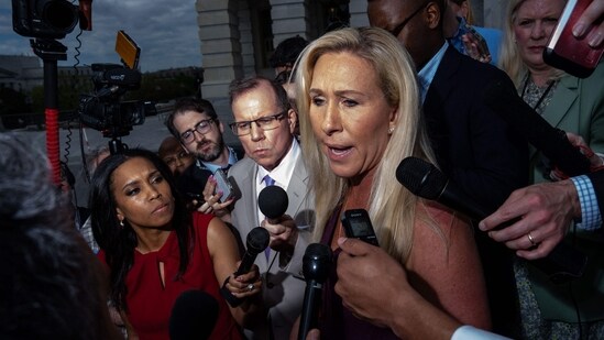 Marjorie Taylor Greene emphasized they stood with Trump from the start, mentioning that they “never backed down, never stabbed him in the back, never tried to beat him.”(Getty Images via AFP)