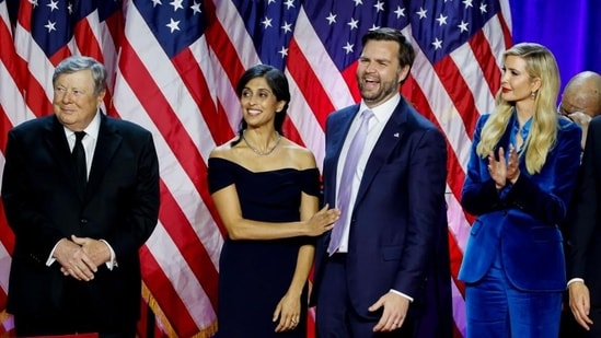 Usha Chilukuri Vance, wife of JD Vance, centre left, Senator JD Vance, a Republican from Ohio and Republican vice-presidential nominee, centre right, during an election night event with former US President Donald Trump, not pictured, at the Palm Beach Convention Center in West Palm Beach, Florida, US, on Wednesday. (Bloomberg)