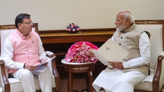 Uttarakhand chief minister Pushkar Singh Dhami with Prime Minister Narendra Modi.