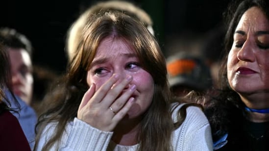 Kamala Harris supporters left emotional as Donald Trump claims victory in the US presidential election 2024.(Angela Weiss/AFP via Getty Images)