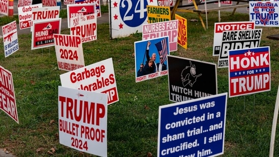 Campaign signs at the Trump Town USA merchandise store in Boons Mill, Virginia, US, on Sunday, Nov. 3, 2024. Voting rights advocates criticized the US Supreme Court's decision to allow Virginia to remove an estimated 1,600 residents from its voter rolls on the eve of the election as a misuse of the oft-criticized shadow docket. Photographer: Al Drago/Bloomberg(Bloomberg)