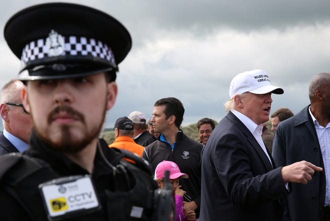 Republican presidential candidate Donald Trump speaks to the media on the golf course at his Trump International Golf Links in Aberdeen, Scotland, June 25, 2016.