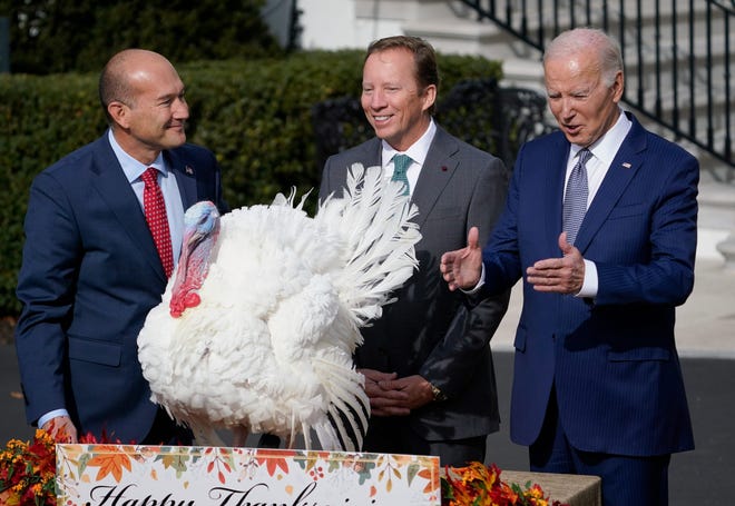 President Joe Biden pardons the National Thanksgiving Turkey Liberty during a ceremony at the White House on November 20, 2023 in Washington, D.C., with Jose Rojas, left, Vice-President of Jennie-O Turkey Store, and Steve Lykken, middle, Chairman of the National Turkey Federation.