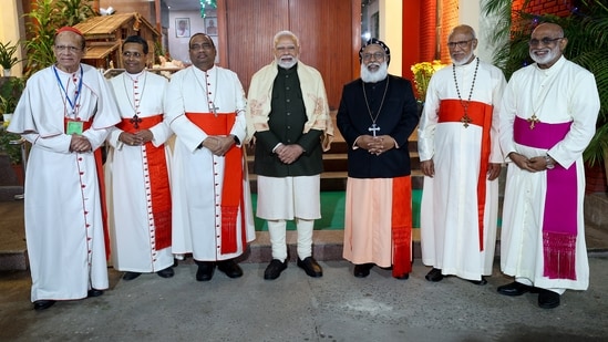 Prime Minister Narendra Modi poses for a group picture with Archbishops, Bishops and CBCI members during the Christmas celebrations hosted by the Catholic Bishops' Conference of India (CBCI).(DPR PMO)