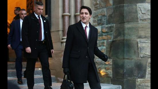 Canada's Prime Minister Justin Trudeau leaves Parliament Hill after attending a cabinet meeting in Ottawa, Canada on December 20. (AFP)