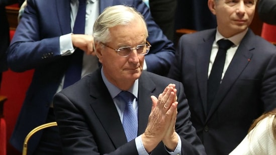 French Prime Minister Michel Barnier gestures after the result of the no-confidence vote on his administration at the National Assembly in Paris on December 4, 2024 as French MPs voted to oust his government after just three months in office in a move which deepens a political crisis in the country.(AFP)