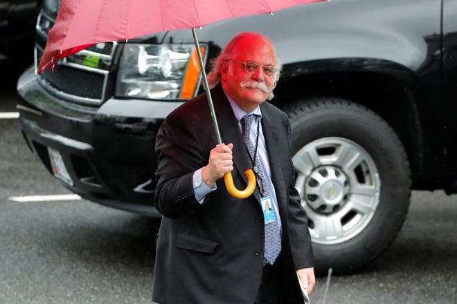 Outgoing White House attorney Ty Cobb walks to his car at the White House in Washington, on May 17, 2018.