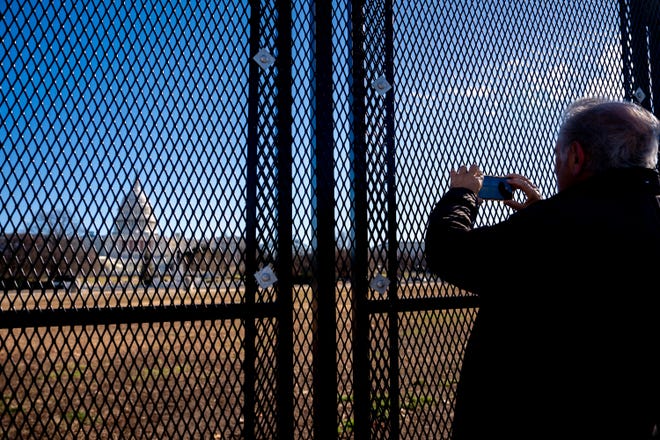 The Dome of the U.S. Capitol Building is visible as new temporary protective fencing is erected near the West Front of the U.S. Capitol Building on Dec. 30, 2024 in Washington, D.C. Along with security for the inauguration, the U.S. Capitol Building will get enhanced security protection for the vote count on Jan. 6, 2025, to certify the election, similar to a State of the Union Address, after the Department of Homeland Security designated it a national special security event.