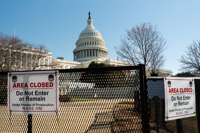 Temporary fencing is visible around the perimeter of the U.S. Capitol building on Dec. 31, 2024, ahead of the Jan. 6 certification of the election and Jan. 20 inauguration.