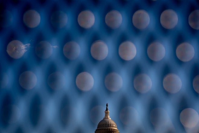 The Dome of the U.S. Capitol Building is visible as new temporary protective fencing is erected near the West Front of the U.S. Capitol Building on Dec. 30, 2024 in Washington, D.C. Along with security for the inauguration, the U.S. Capitol Building will get enhanced security protection for the vote count on Jan. 6, 2025, to certify the election, similar to a State of the Union Address, after the Department of Homeland Security designated it a national special security event.